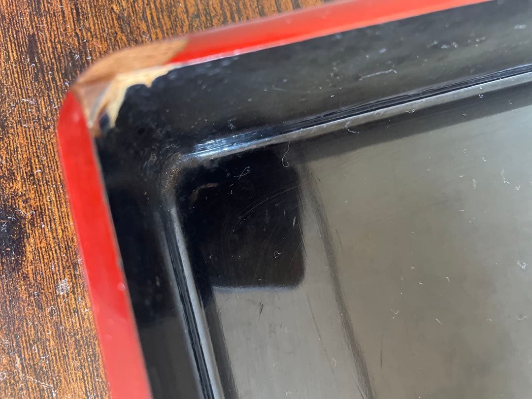 扇形装飾の赤い重箱