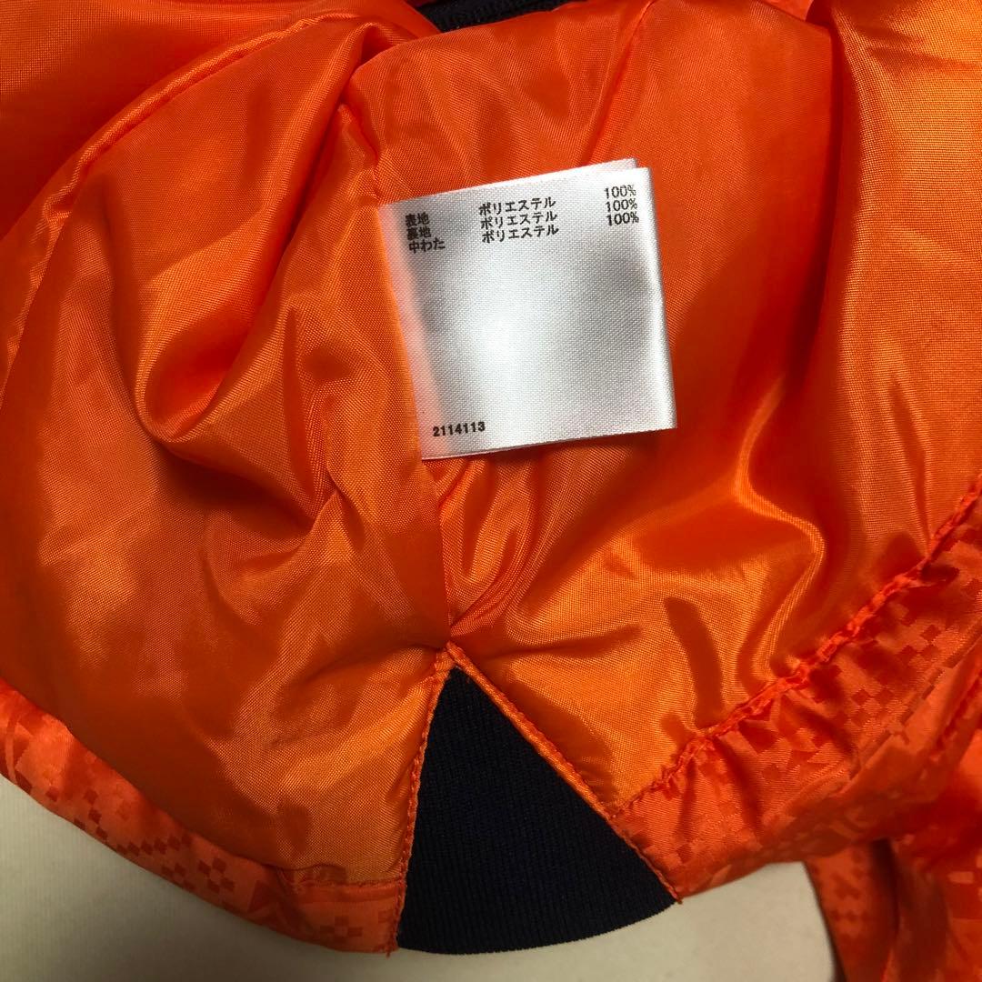 セットアップ マンシングウェア 中綿 パーカー スカート オレンジ 総柄 M