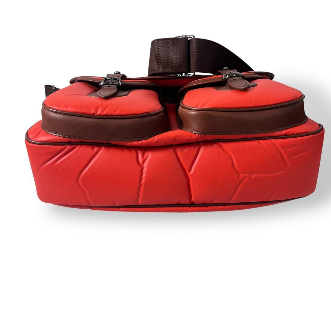 ハンティングワールド バチューサーパス キャリーオール オレンジ バッグ