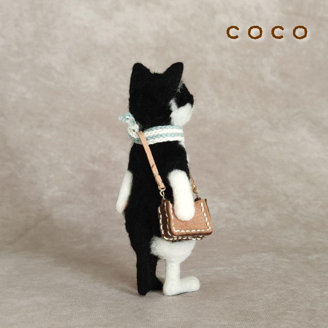 ショルダーバックを下げた小まめさん