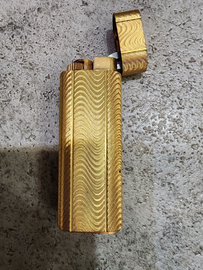 カルティエ ライター ゴールド オーバルストライプ PLAQUE OR
