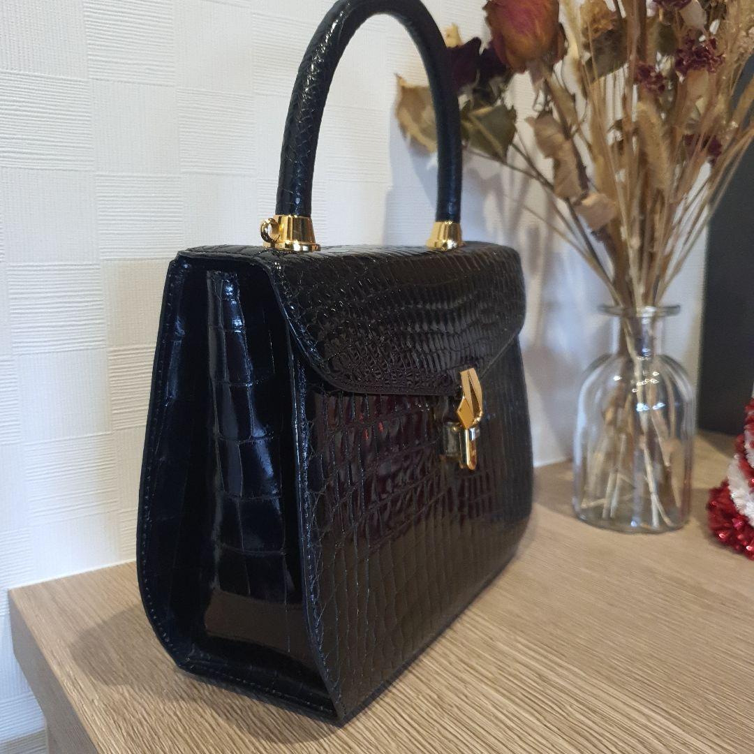 シャイニンクロコダイル本革ハンドバッグ ブラック