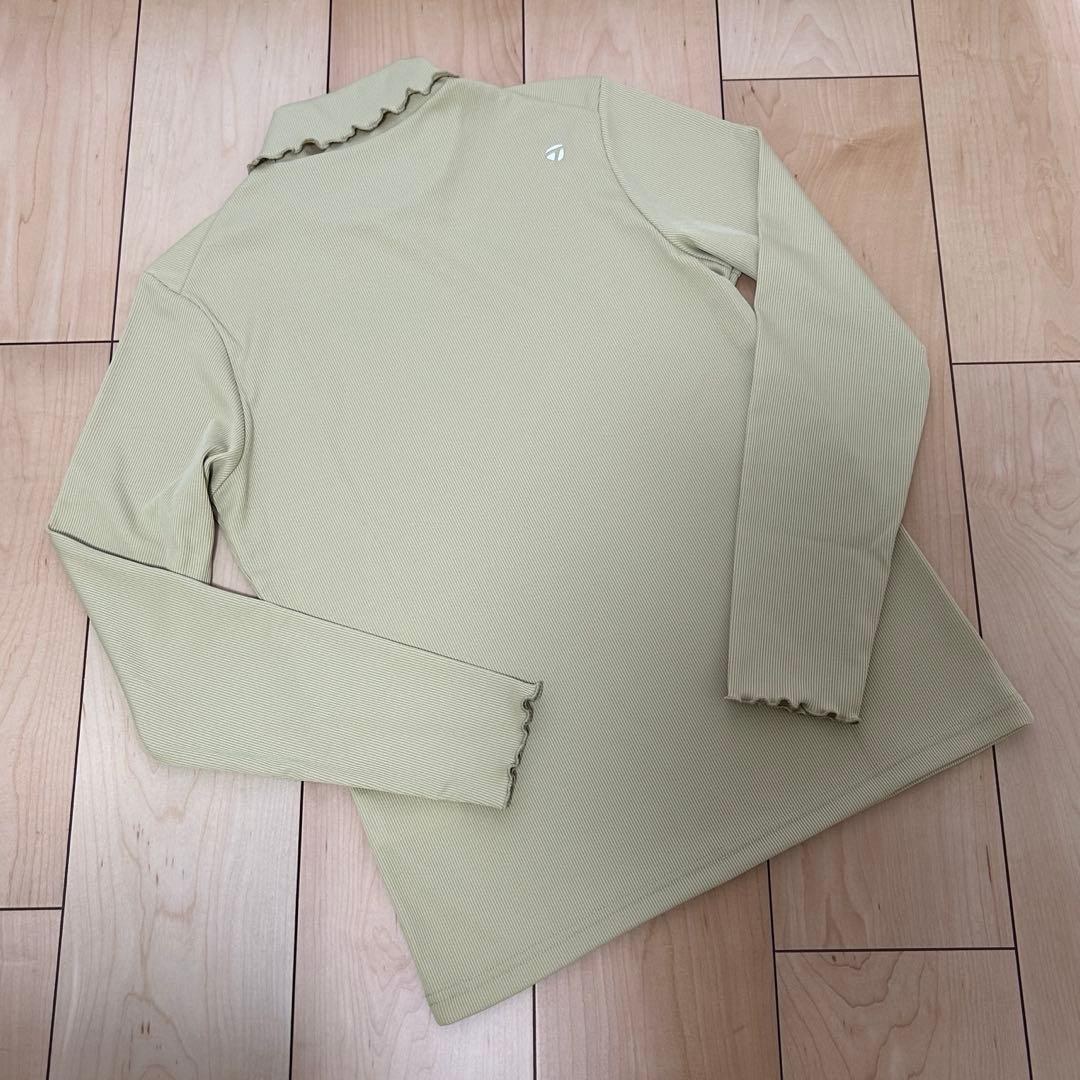 テーラーメイド　フリルハイネック長袖シャツ　クリームイエロー　M