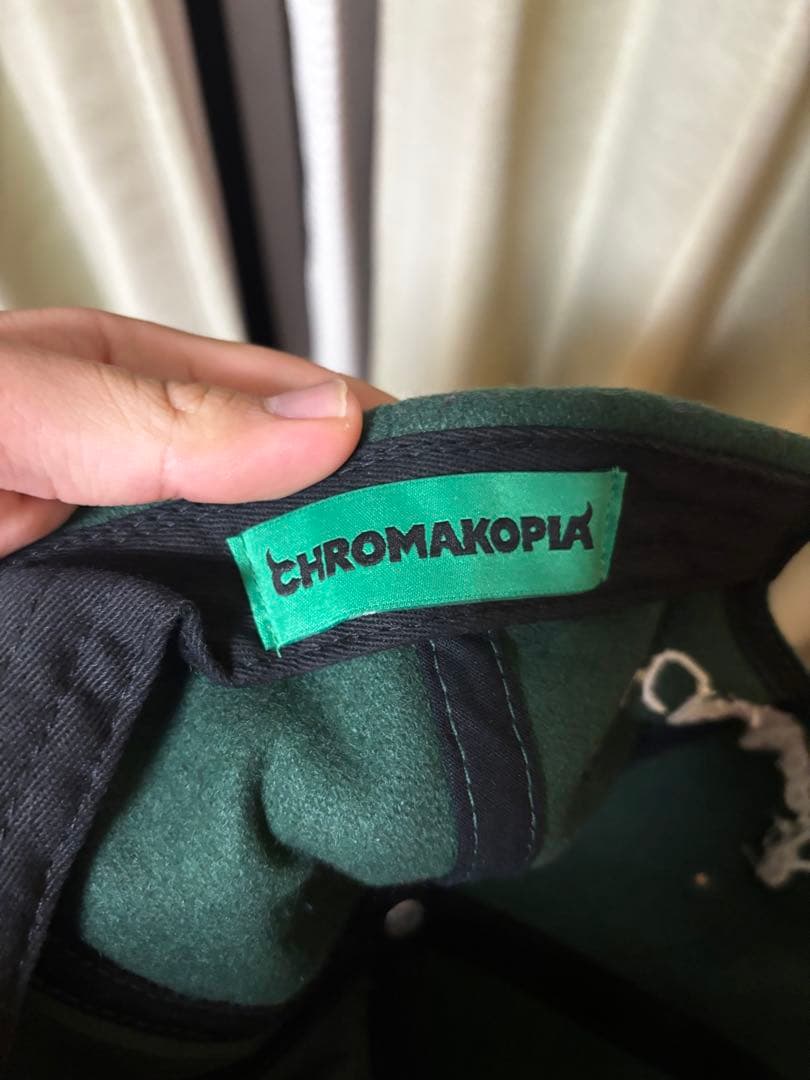 Chromakopia ダークグリーンキャップ