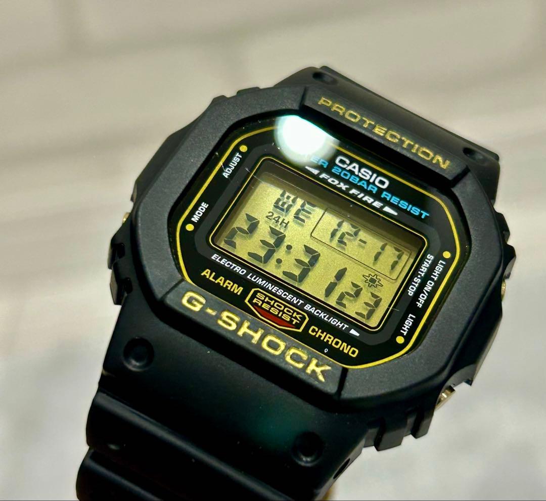 アッツG-SHOCK DW-5600Eゴールド液晶 FOXFIRE