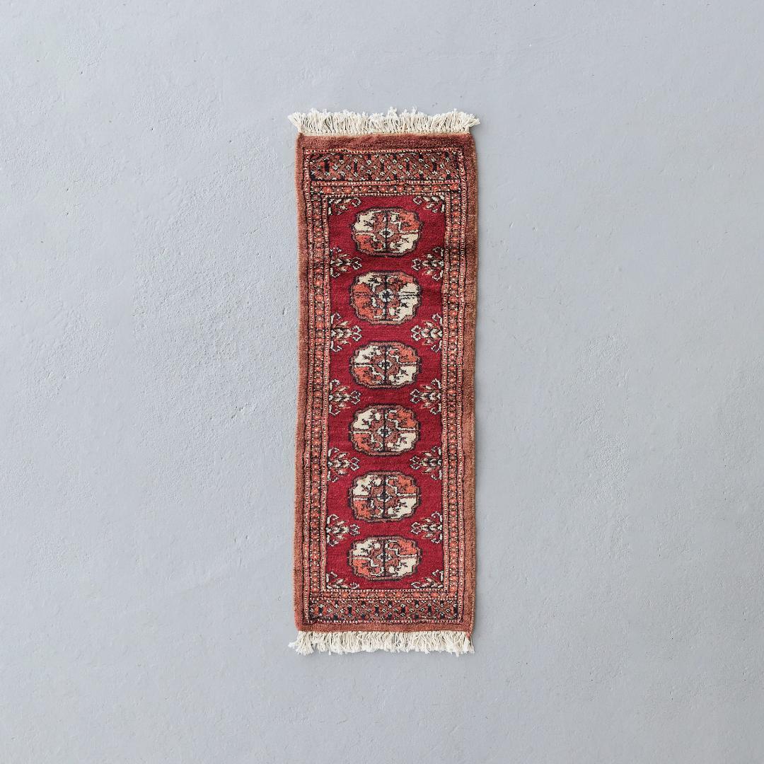 ヴィンテージラグ　トライバルラグ　パキスタン（95×33cm）赤　茶　オレンジ