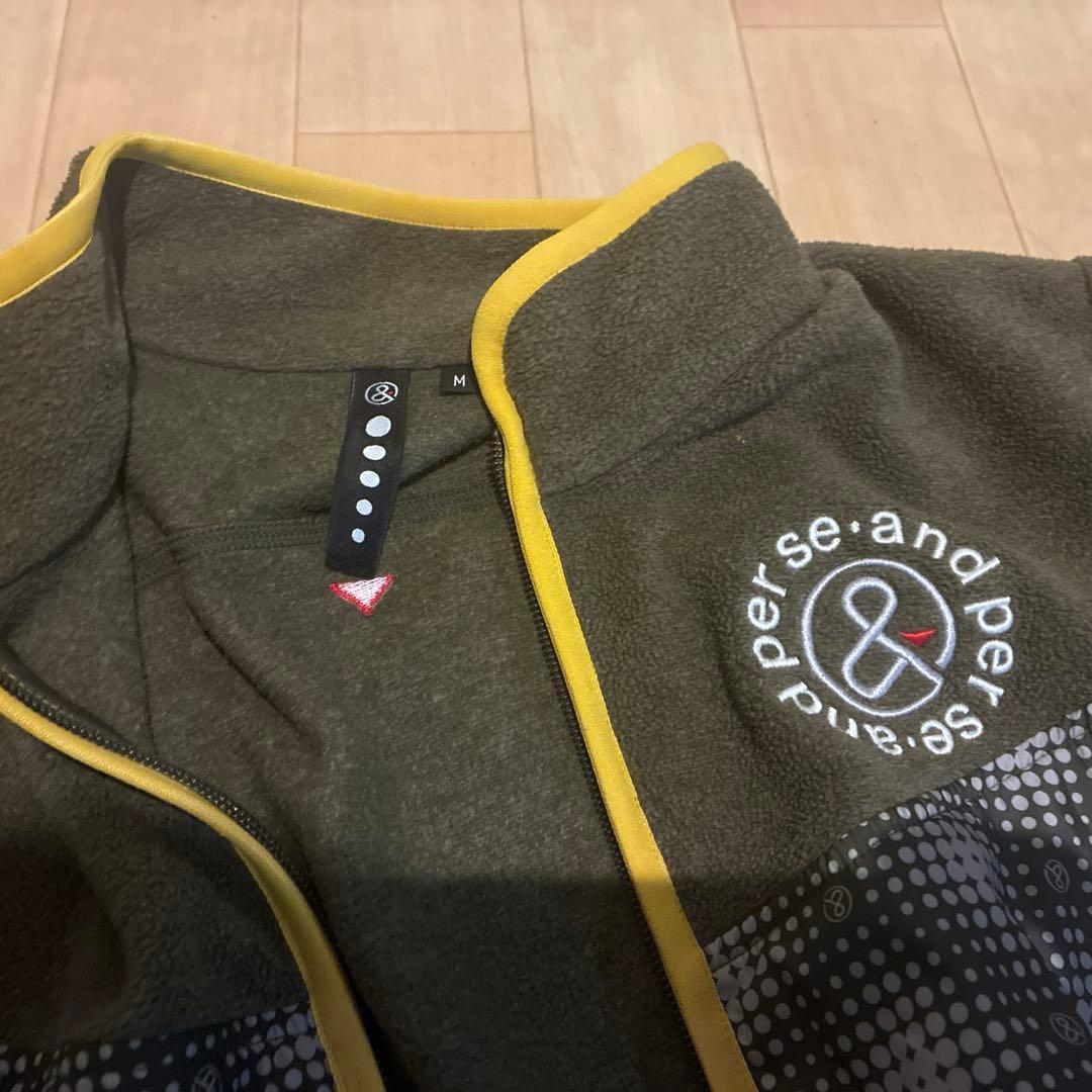 and per se ジップアップジャケット