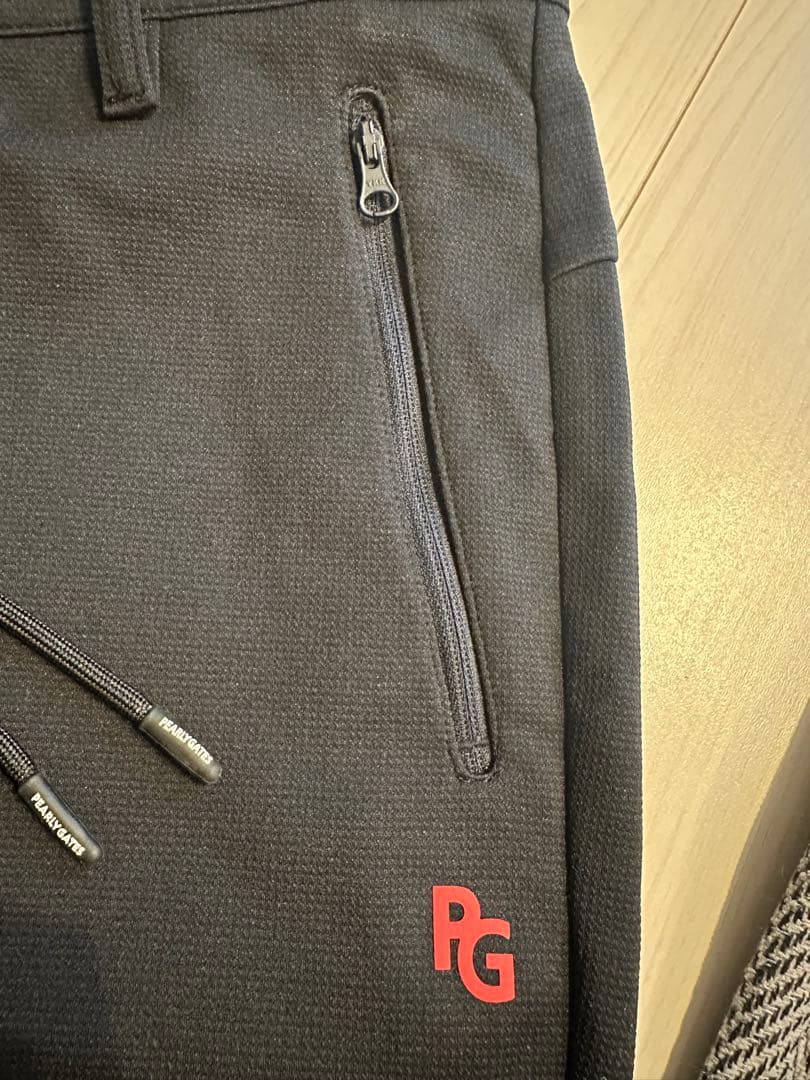 パーリーゲーツ黒のウエスト調整可能なパンツ