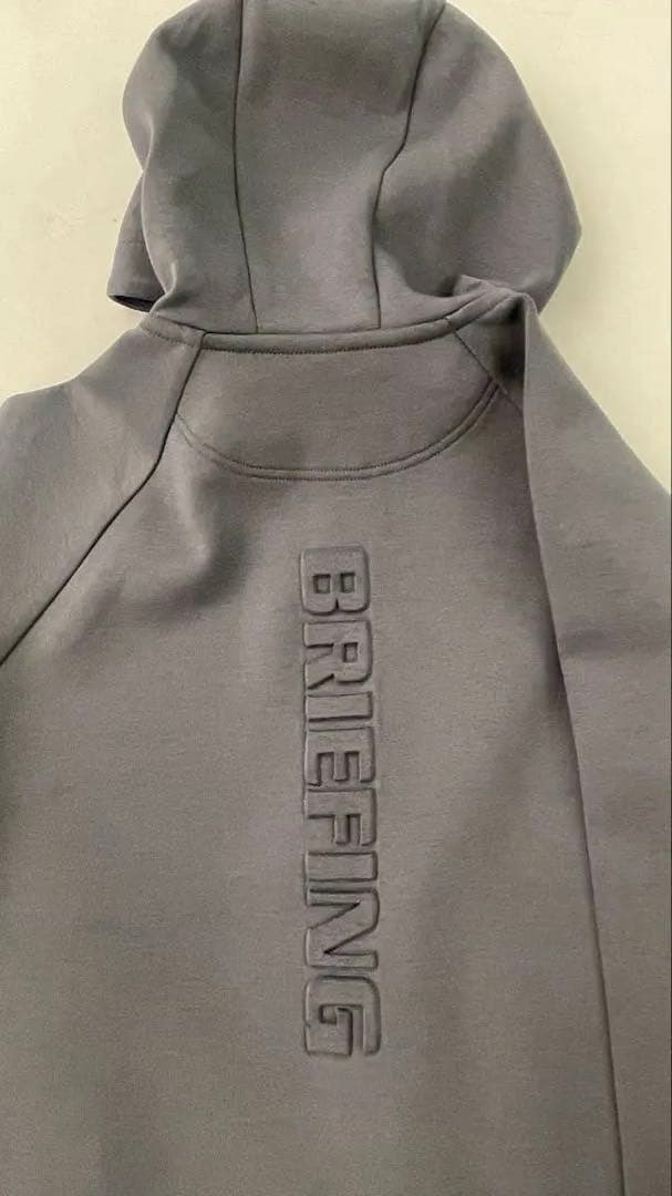 BRIEFING フード付きグレーパーカー