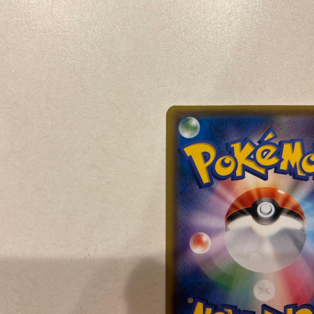 ポンチョを着たイーブイ（ブラッキー） PROMO SM-Pプロモカード